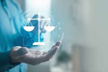 Hand presenting digital justice scale, representing AI ethics, fairness, data privacy, legal...