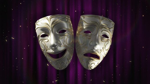 Classic gilded comedy and tragedy theater masks dramatically spotlit on a proscenium stage,ideal for theatrical videos