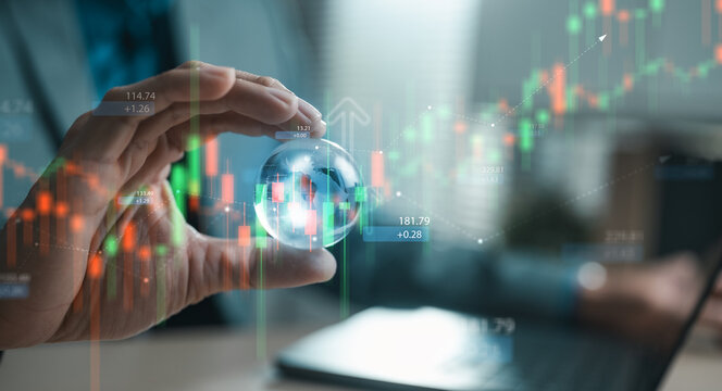 Hand holding globe with market charts, representing fiscal policy, economic growth, investment strategy, global finance trends and wealth management decisions.