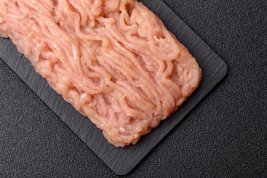 Raw fresh ground chicken, turkey, or pork for burgers or meatballs. Raw ground chicken