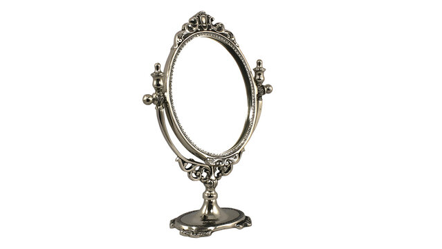 Vintage ornate tabletop mirror with oval frame and decorative stand on transparent background