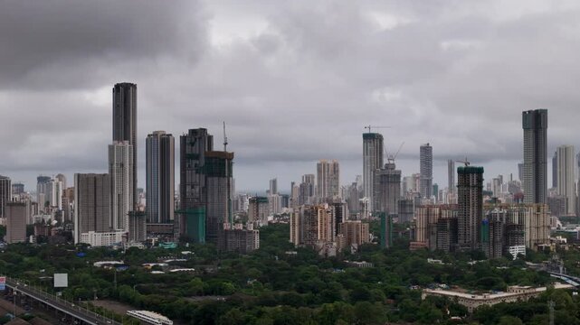 Scenic Aerial View of Mumbai Skyline During Monsoon Season with Modern Skyscrapers, High Rise Buildings, Cloudy Weather, Rain Covered Urban Landscape, Coastal Cityscape and Dramatic Metropolitan Archi
