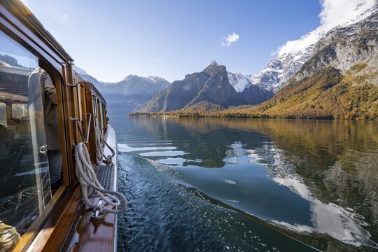 Tourist boat on the K&ouml;nigssee, Watzmann massif, autumnal mountain landscape reflected in the lake, Berchtesgaden National Park, Berchtesgadener Land, Upper Bavaria, Bavaria, Germany