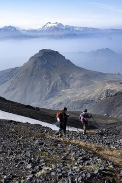 Two hikers on hiking trail through volcanic landscape, view of mountain landscape, hiking trail Fimmv&ouml;r&eth;uh&aacute;ls, &THORN;&oacute;rsm&ouml;rk Nature Reserve, Su&eth;urland, Iceland