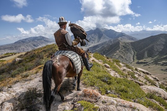 Traditional Kyrgyz eagle hunter, near Kysyl-Suu, Kyrgyzstan