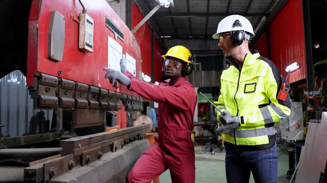 Training session on industrial safety protocols manufacturing facility instructional images indoor eye-level workplace safety awareness