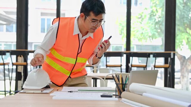 Construction planning meeting office space professional environment engaged worker collaboration concept