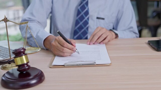 Legal action document preparation office workspace professional setting modern environment focused viewpoint law concept