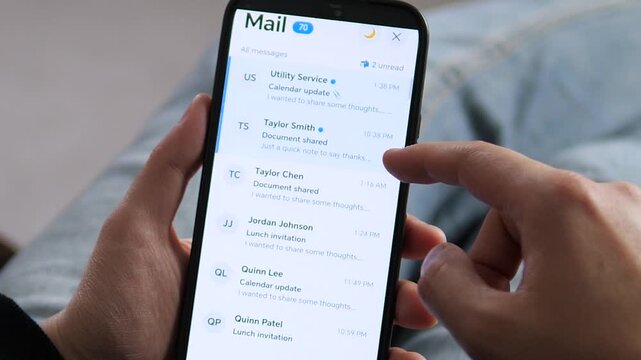 Modern professional scrolling through a mobile email inbox. Features business document shares and meeting invites. Ideal for corporate, remote work, and productivity tech content. High-quality 4K