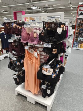 Royan, France - May 10, 2026: E.Leclerc. Display rack featuring various women's lingerie including bras and panties in multiple colors at a retail store