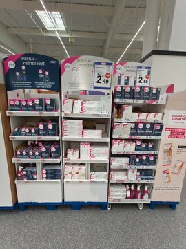 Royan, France - May 10, 2026: E.Leclerc. Veet hair removal products displayed on shelves in a retail store with promotional signage and pricing visible