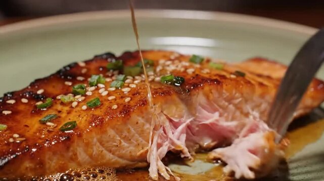 Macro Flaking of Pan Seared Salmon with Swicy Miso Glaze on Sage Green Plate