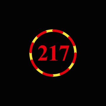 Spinning number two hundred seventeen icon with rotating red and yellow circle border in motion graphics.