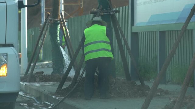 4K Real-shot Video of the Back View of Workers Doing Urban Road Greening