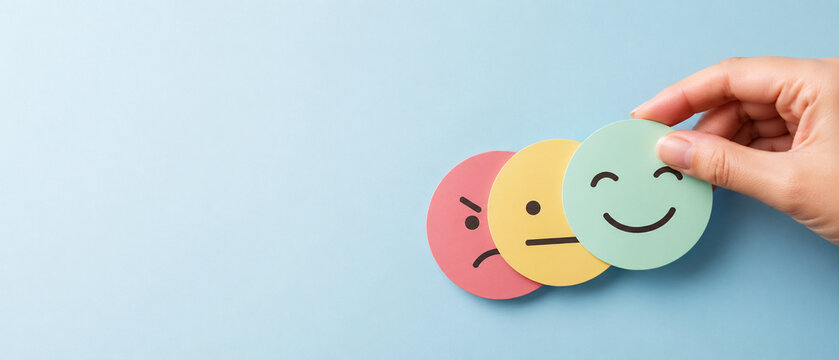 Hand Choosing Happy Face Customer Feedback Concept