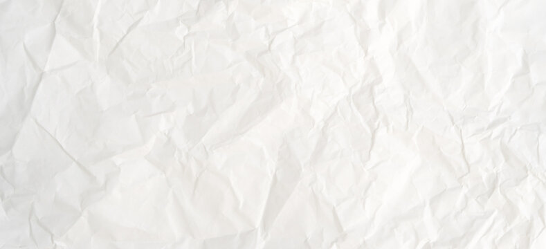 Top view and full frame of wrinkled or crumpled white paper texture used as crumpled white paper background texture in decorative art work
