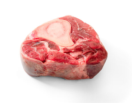 Fresh raw beef shank with a prominent bone, showcasing rich marbling and deep red meat texture on white background. Sliced meat Osso Buco isolated.