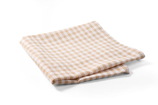 A neatly folded beige-and-white gingham kitchen towel on a clean white background. Beige napkin isolated