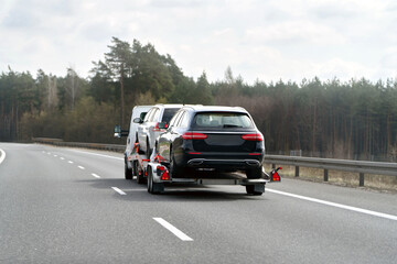 Emergency towing service hauling broken down vehicle