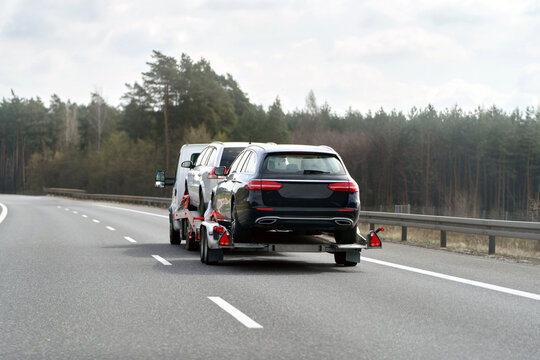 Emergency towing service hauling broken down vehicle