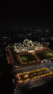 Aerial night & vertical shot of Secretariat of Telangana in Hyderabad, India