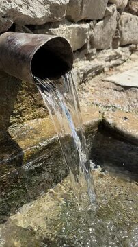 Natural Forest Stream Flowing from a Spring Realistic Waterfall, Fountain Cascade, Ripple Mist in a Woodland Landscape Fresh Water Source Scenic Nature Footage