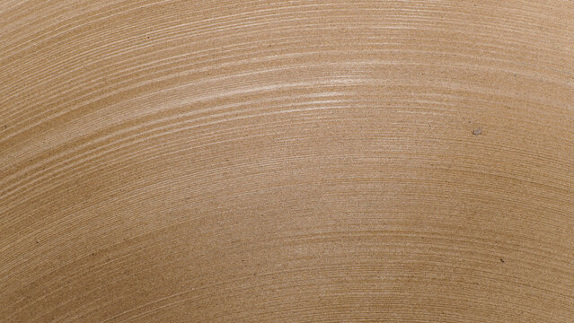 Close up of Natural Textured Surface with Subtle Parallel Curved Lines