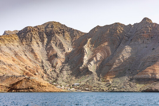 Qana Village in Khasab Viewed from a Traditional Dhow Cruise in the Scenic Fjords of Musandam Peninsula, Oman