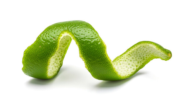 Lime peel curl isolated on white background, vibrant green citrus zest garnish for cocktails and culinary decoration
