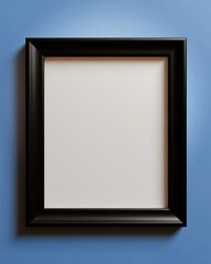 Fototapeta premium Minimalist Black Picture Frame with Blank White Center Isolated on a Solid Blue Wall Background