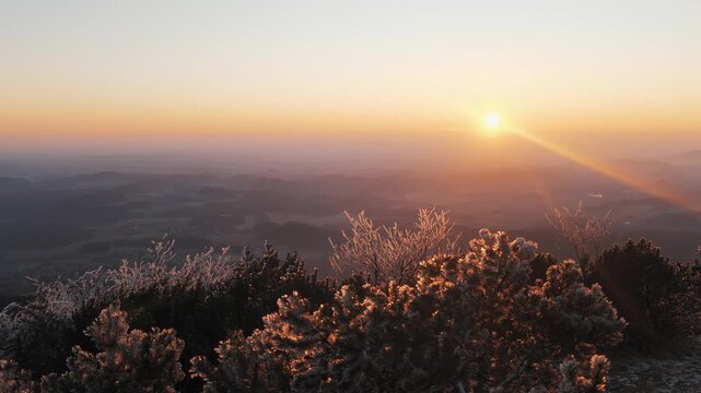 Golden Sunrise Over Misty Valley Landscape from Jested Mountain Viewpoint in Liberec Czech Republic