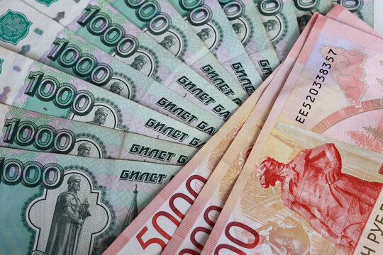 Russian ruble banknotes arranged in a fan shape close up
