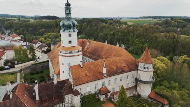 Aerial View of Nove Mesto nad Metuji Castle with Tower Orange Roofs and Green Park