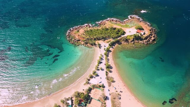 Agii Apostoli Beach Crete Greece aerial top down view of double beach, turquoise water and sand from drone, Chania coast panoramic seascape for travel and vacation content
