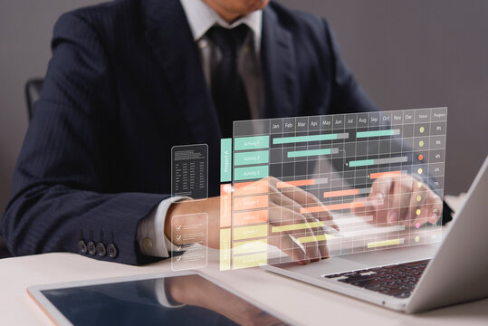 Executive hands working laptop viewing virtual schedule planning software graph. Corporate leader tracking resource allocation activity roadmap analyzing business data administration.