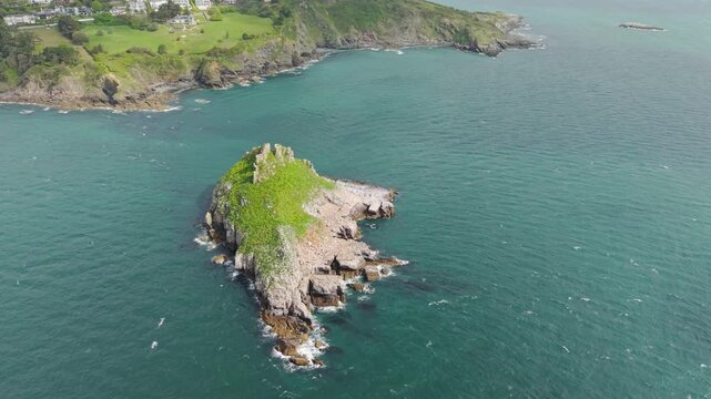 Aerial view of Thatcher Rock, Historical landmark in the United Kingdom. Thatcher Rock is a key sites for studies of Quaternary stratigraphy and sea-level change and forms part of the English Riviera.