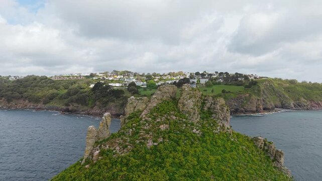 Aerial view of Torquay town. Torquay is a seaside resort town on the English Channel in Devon, south west England. Known for beaches such as Babbacombe and cliffside Oddicombe. Drone POV exploration.
