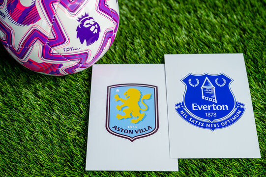 Aston Villa vs. Everton English Premier League clash, club crests and soccer ball on fresh green grass background.