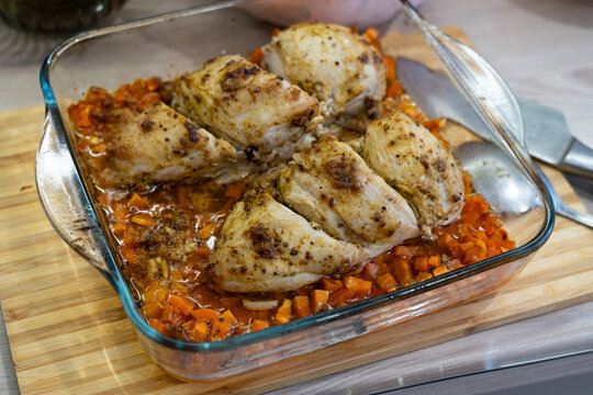 Deliciously Baked Chicken Breast with Savory Vegetables in a Glass Dish, Perfectly Seasoned for a Flavorful Meal Enjoyed with Family and Friends