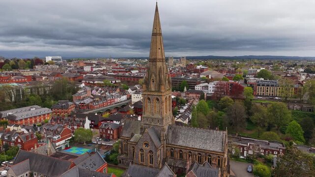 Aerial view of Exeter, which is an ancient city on the River Exe in southwest England. Drone POV of St Michael and All Angels Church, on Mount Dinham in Exeter is an Anglican church in Devon, England.