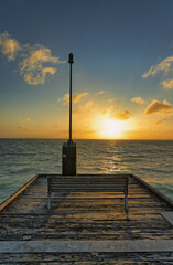 Fototapeta premium Sunset Over the Ocean at Ceduna Pier in Australia
