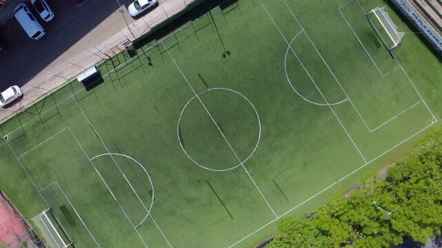 Overhead shot of a clean football field, spinning view