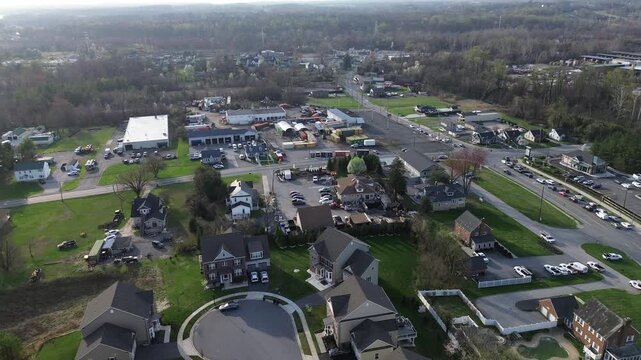 Culdesac commercial fringe highlights large homes near Straw Lily Way with adjacent warehouses business lots shaping White Marsh transition zone, Maryland