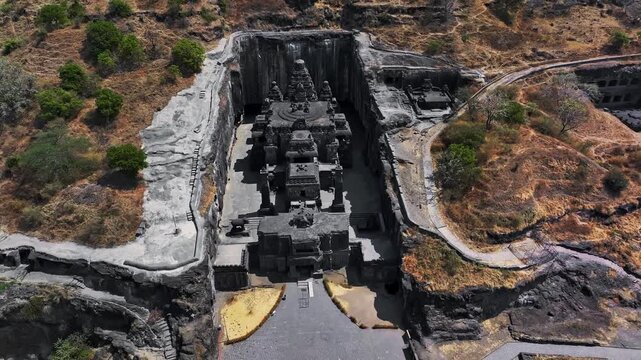 Aerial view of the Kailasa Temple at Ellora Caves in Maharashtra, India. This ancient rock-cut temple, carved from a single monolithic structure, stands as a masterpiece of Indian architecture.
