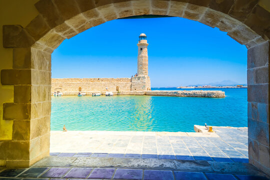 harbor and lighthouse of Rethymno old town, Crete, Greece, retro toned