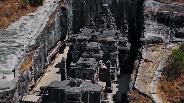 Aerial view of the Kailasa Temple at Ellora Caves in Maharashtra, India. This ancient rock-cut temple, carved from a single monolithic structure, stands as a masterpiece of Indian architecture.