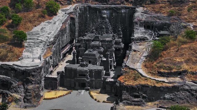 Aerial view of the Kailasa Temple at Ellora Caves in Maharashtra, India. This ancient rock-cut temple, carved from a single monolithic structure, stands as a masterpiece of Indian architecture.