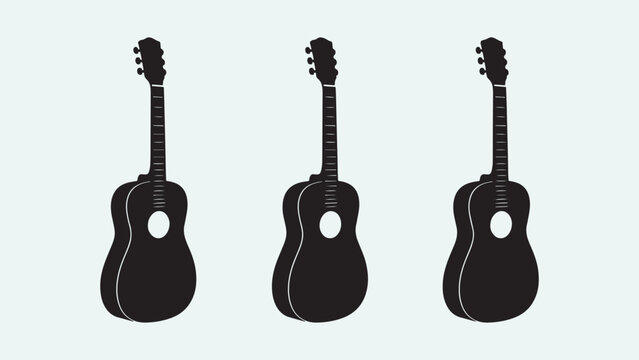 Three black acoustic guitars standing side by side in a row
