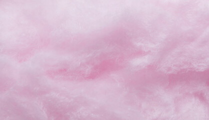 Fototapeta premium Sweet candy floss dessert abstract pink natural texture, cotton candy fluffy background for summer holidays, birthday and fashion party celebration.