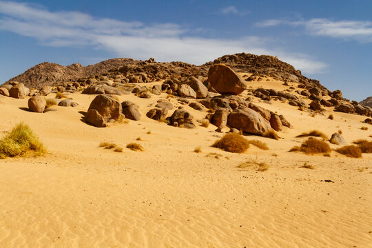 A landscape of the Sahara Desert. Incredible rock formations featuring large rounded rocks. Tassili n'Ajjer National Park, Algeria, Africa